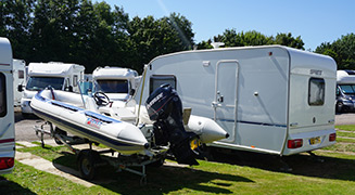Rigid Inflateable Boat (RIB) and Caravan